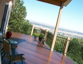 The Massaranduba hardwood deck also features a custom deck cover built with a tongue and groove knotty pine ceiling.