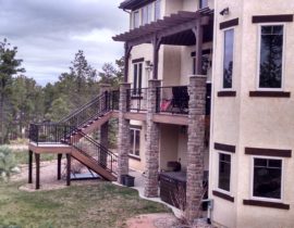 We added a stairway with a 180-degree turn landing. This allows the homeowner to easily access the hot tub area below the deck.