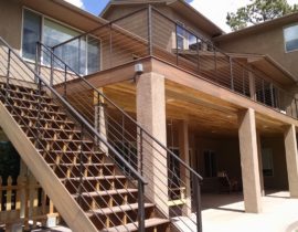 This show the deck from ground level and you can see where we installed a dry space under the deck which doubles the outdoor living space.