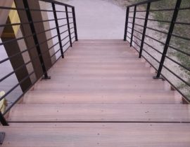 We built the homeowners a wide, open staircase which allows for easy access to the lower area.