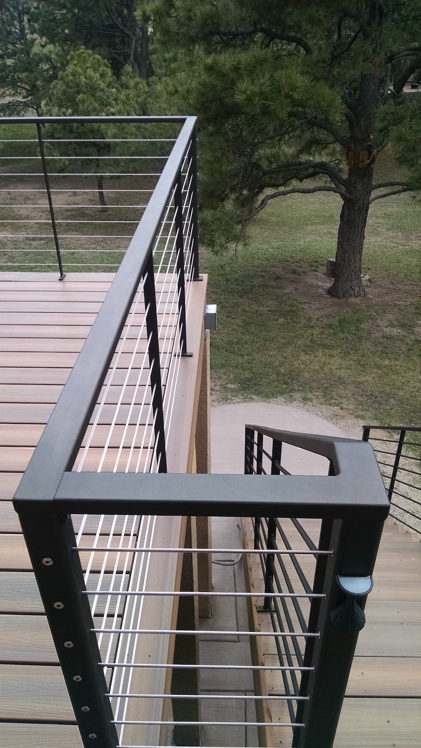 Custom designed metal and stainless steel, horizontal cable railing.