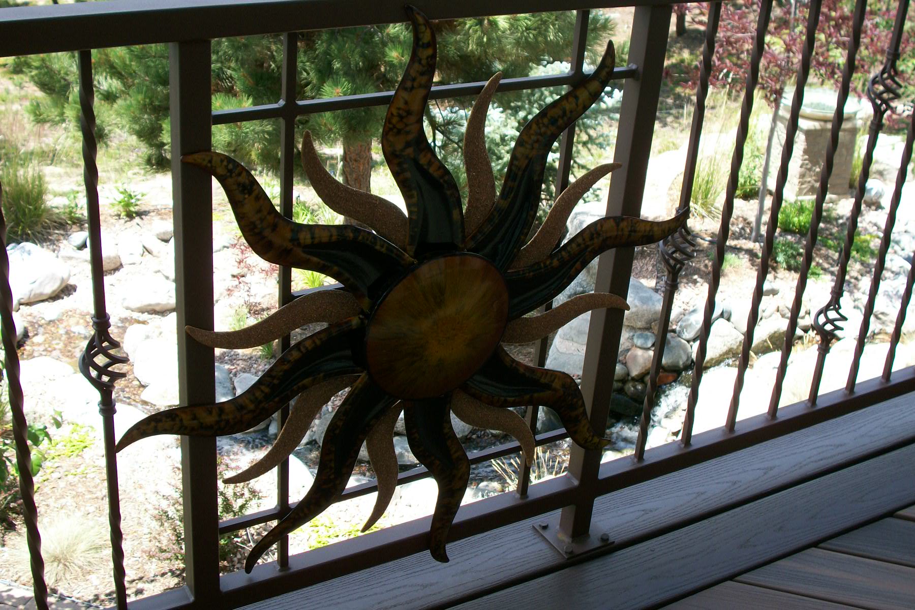 The owners asked us to incorporated a unique piece of metal art into the deck railing