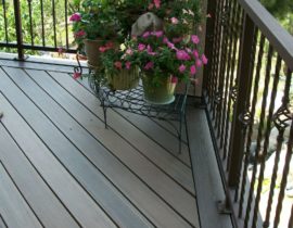 The twisted balusters with basket design and a double picture frame border on the deck help make the deck uniquely theirs.