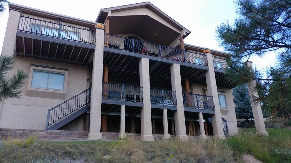 Two composite decks with steel deck frames and stucco columns