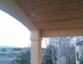 We worked with the customer to design a beautiful gabled deck cover featuring a vaulted tongue and groove ceiling with recessed can lights and a ceiling fan.