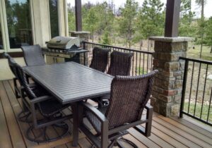 Beautiful composite deck with custom wrought-iron railing