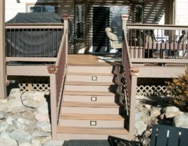 4'-wide, closed steps with stair lights installed on alternating step risers.