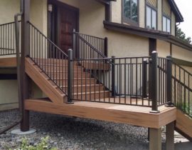 5'-wide, closed steps with a 45-degree turn landing and metal panel railing.