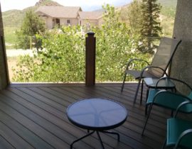The homeowner chose to have the decking at 45-degrees with a double picture frame. They also decide on a glass railing with composite posts.