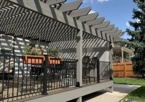 The homeowneres wanted to install a drop down shade to their pergola for privacy and as a sunblock.