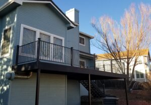 Elevated, composite deck framed with powder coated galvanized steel deck framing.