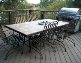 Decking boards are at a 45-degree angle with a single picture frame in a different color of material.