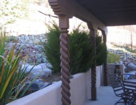This pergola was built using custom, spiral-design posts for a unique look.