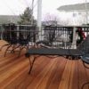 B Grade redwood deck with pergola and metal deck railing