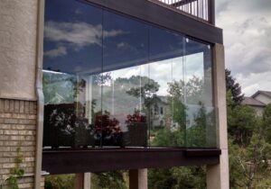 We installed sliding glass panels so the customer can open up the room to fresh air