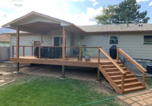 Full view of the redwood deck and gabled deck cover.