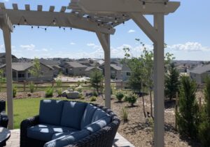 We built an arbor over the customer's patio. Not only does it provide some shade but it adds a very unique architectural design element to their outdoor living space.