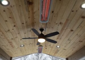 We added a ceiling fan and two space heaters to the ceiling of the deck cover.
