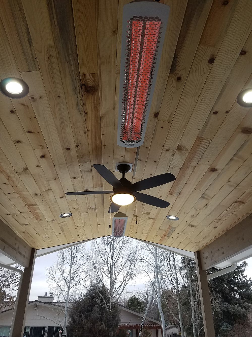 Vaulted deck cover with two heating units installed
