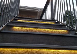 LED strip lights were installed under the stair lip for night time safety