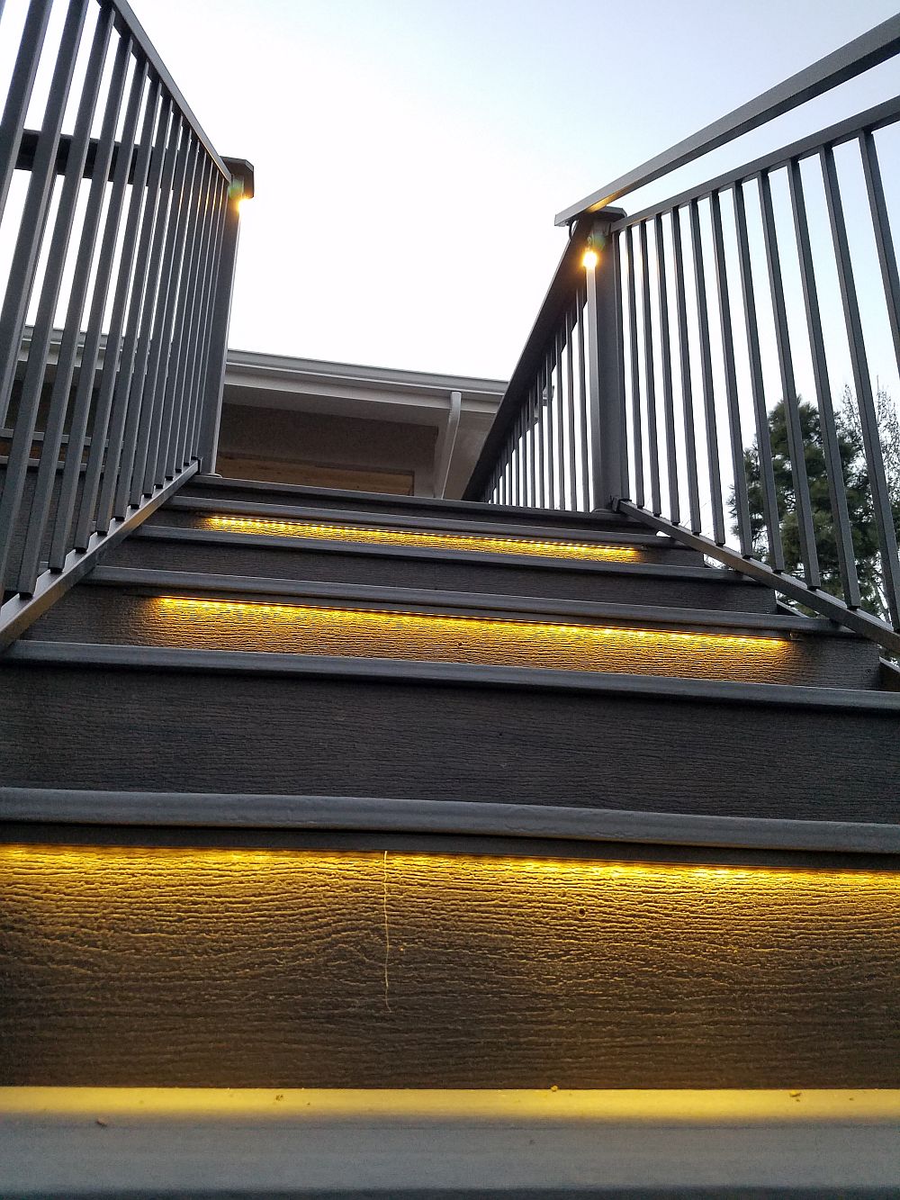 Composite deck stairs with LED step lights