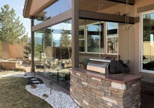 The owners have a built-in grill right outside the side door of the new sun room.