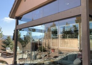 Beautiful sunroom created from an existing covered patio. We added glass walls and doors.
