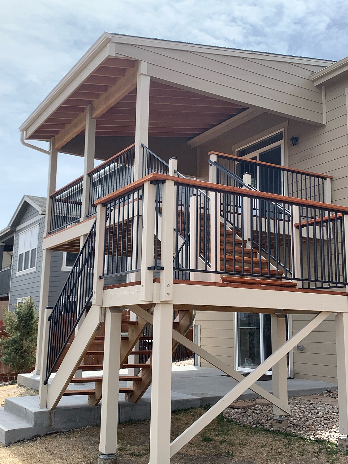 Heart Redwood deck with shed roof deck cover and Fortress railing