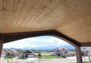 A close up look at the tongue and groove pine vaulted ceiling. You can see the beautiful wood enhances the whole project