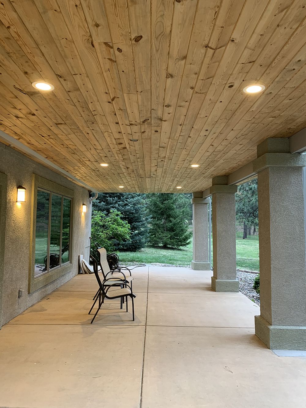 Dry space under steel framed deck with a Blue Pine tongue and groove ceiling