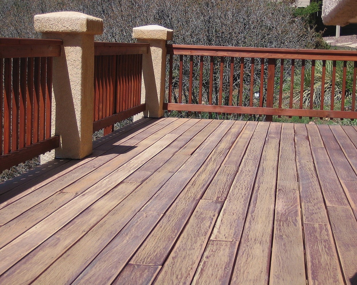 Hardwood deck before it is has been refinished