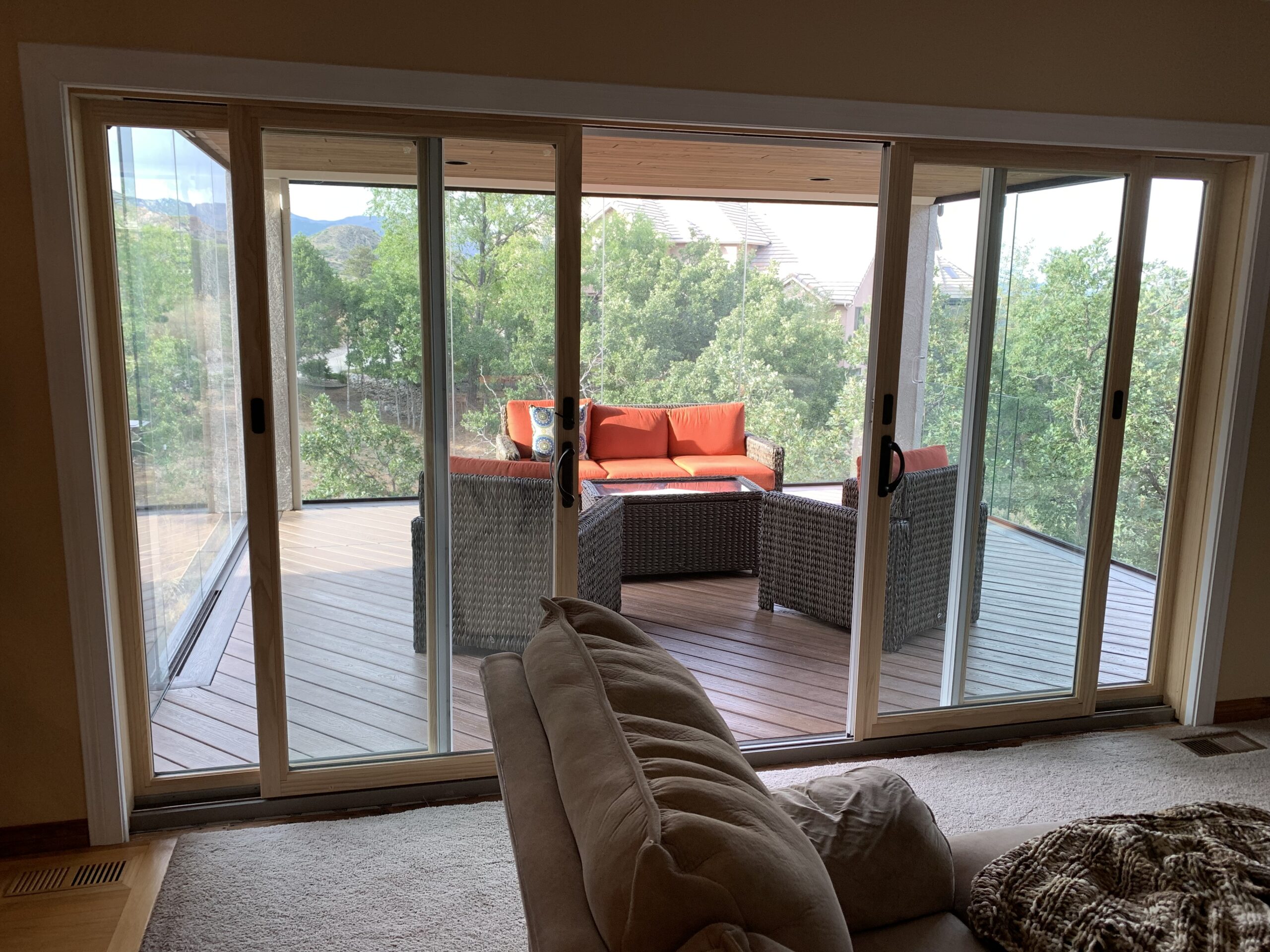 Sliding patio doors installed to provide access to glass enclosed 3-season room