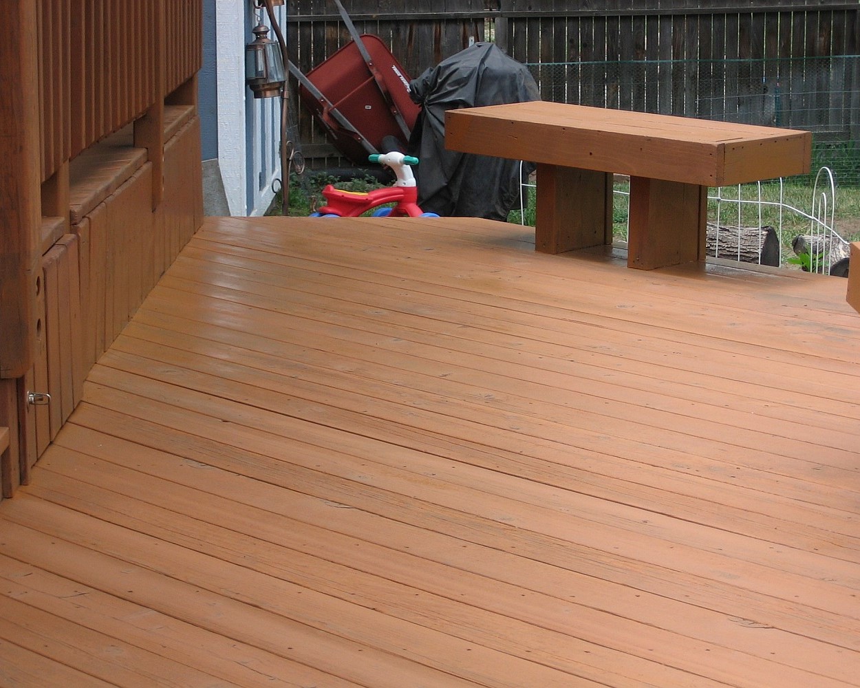 Wood deck after being refinished and stained with a Level 2