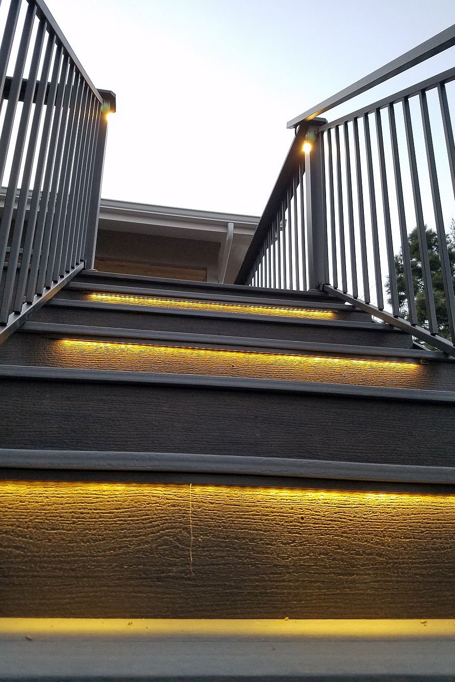 Closed deck stairs that feature an LED strip light on every other step.