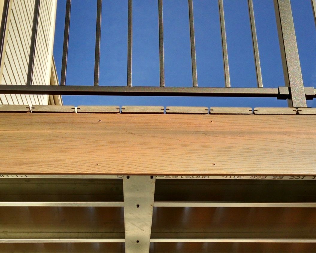 The edge of a composite deck that has not been built with end boards.