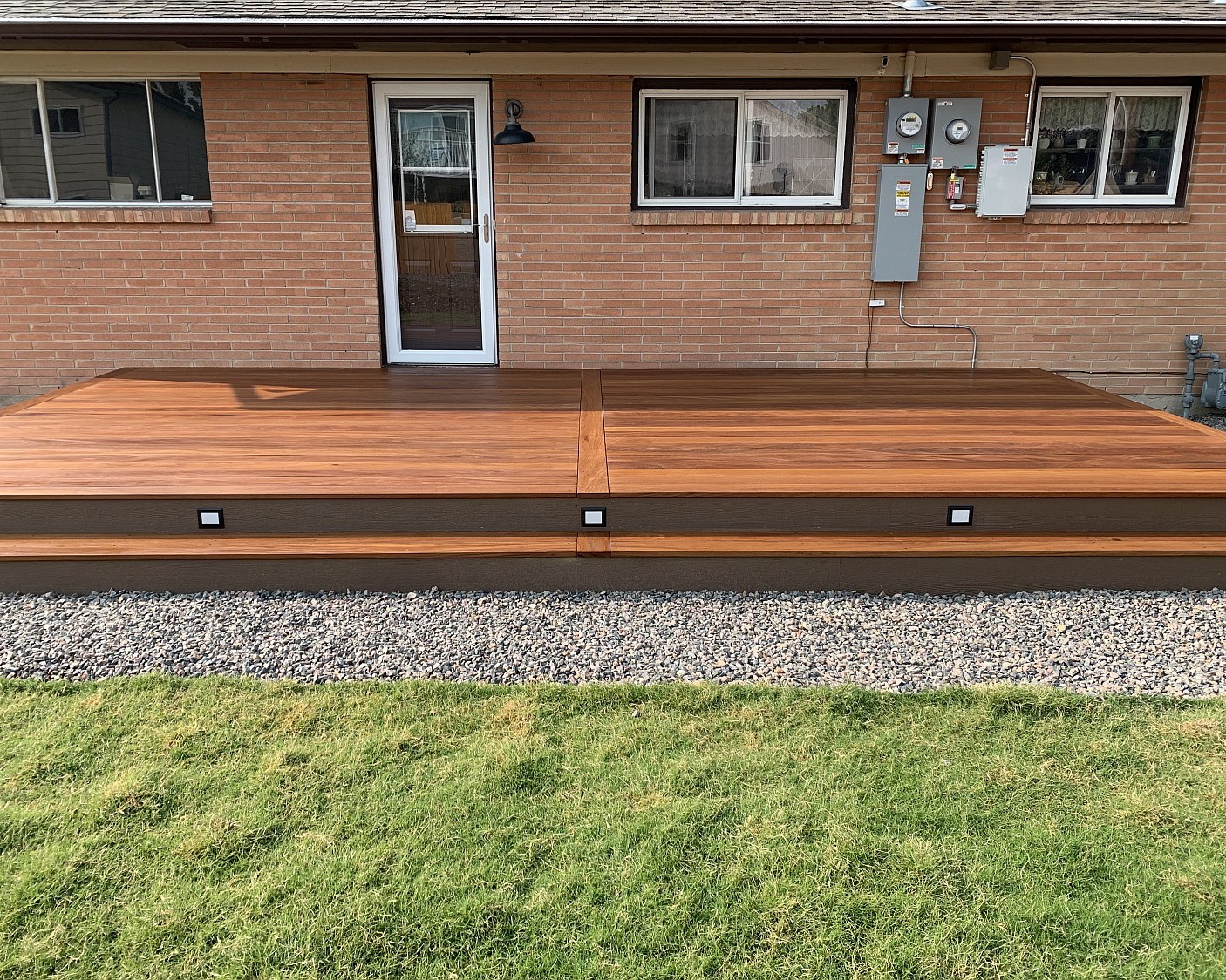 Custom designed cumaru hardwood deck creates a gorgeous area for outdoor entertaining