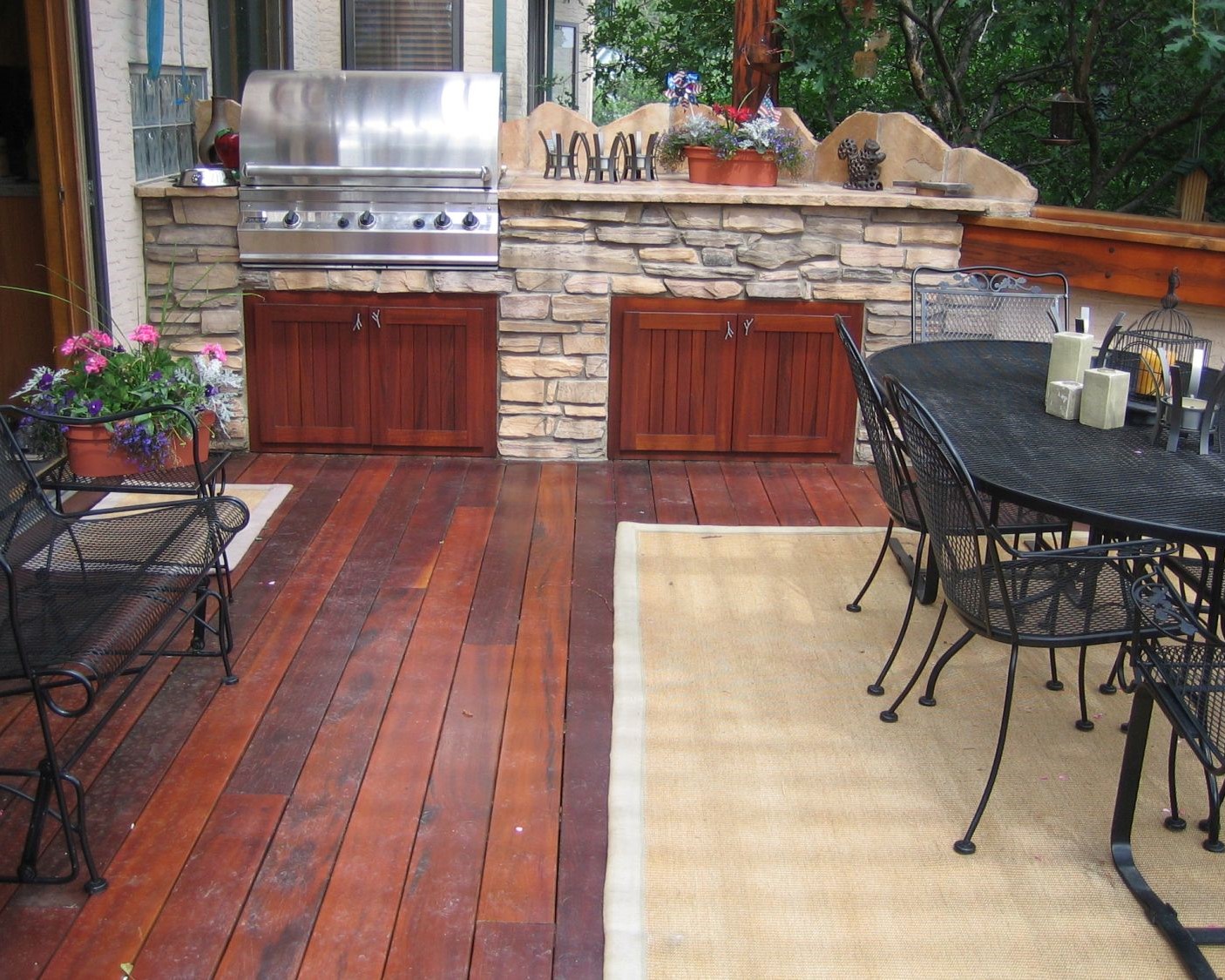 Hardwood deck with custom built outdoor cooking area.