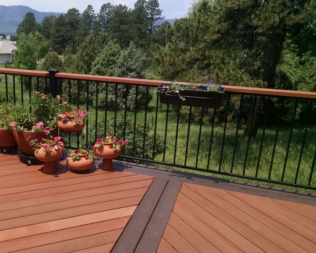 Redwood deck in a herringbone pattern with a double picture frame border in a contrasting color