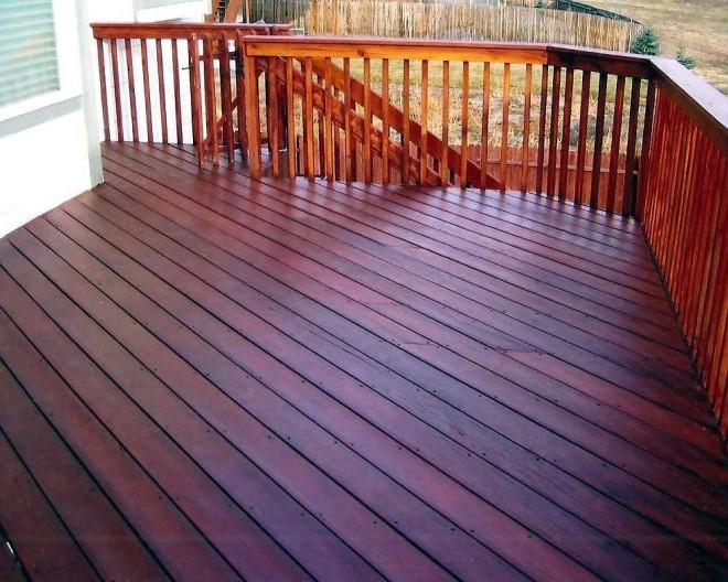 Custom hardwood deck built with Brazilian Redwood decking laid at a 45-degree angle.