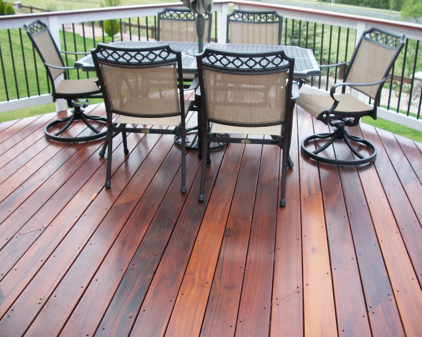 Custom hardwood deck built with Tigerwood and a wood and metal baluster railig