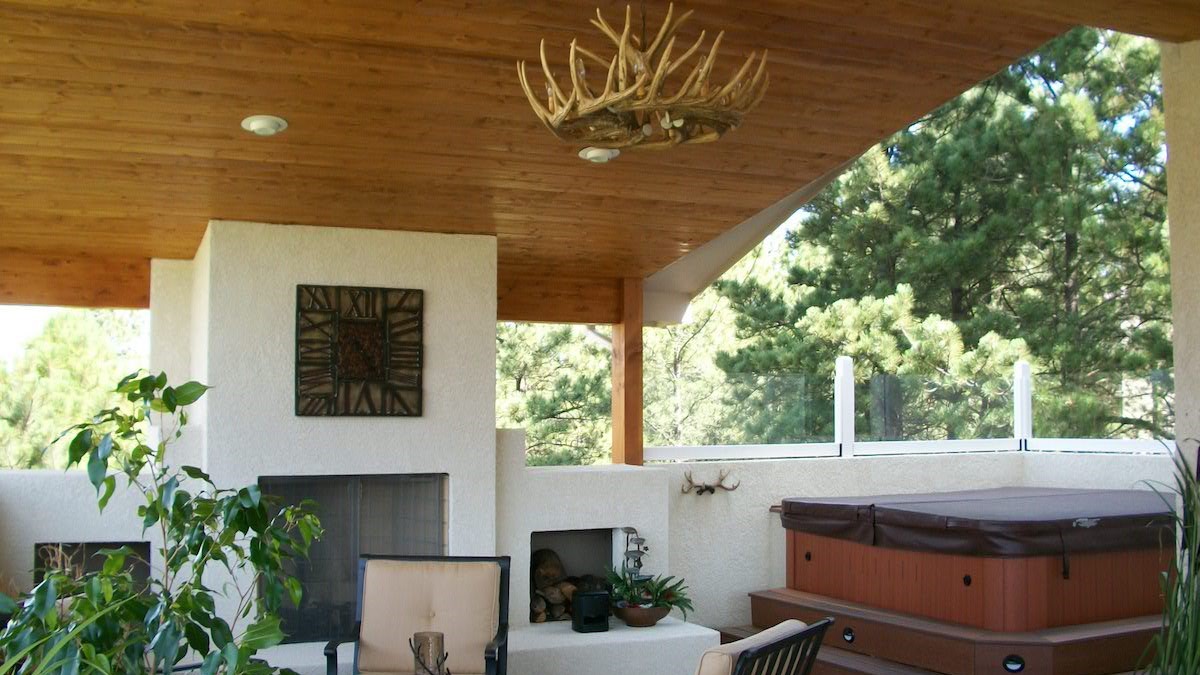 Custom built composite with many extras. Gabled deck cover with vaulted ceiling, custom stucco walls, and a custom designed, stucco, wood-burning fireplace.