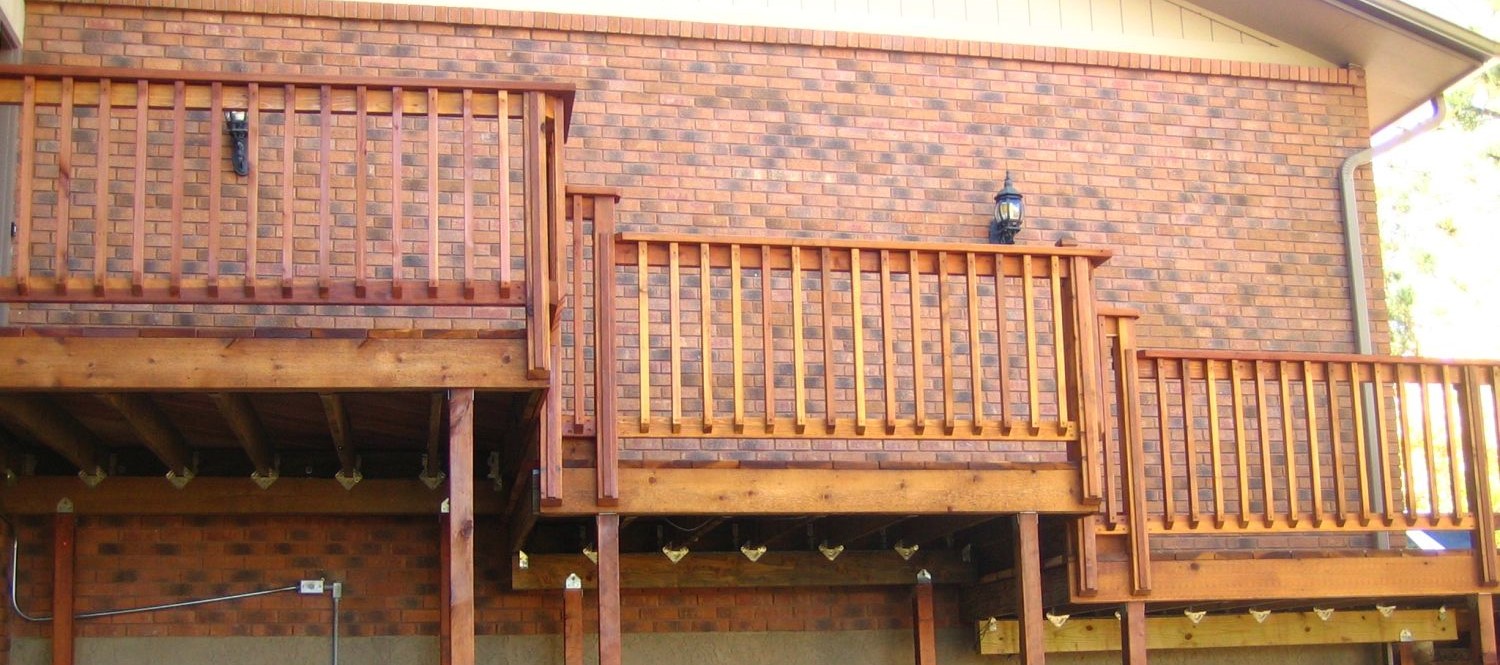 Multi level Redwood deck with a picket fence railing