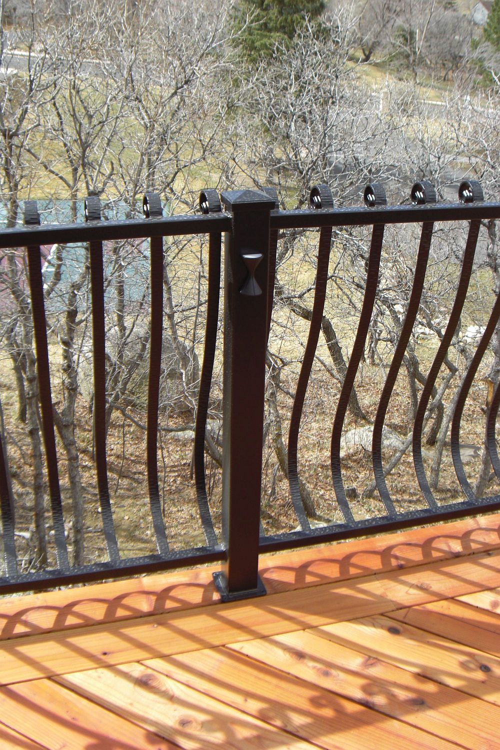 Custom designed, wrought iron deck railing
