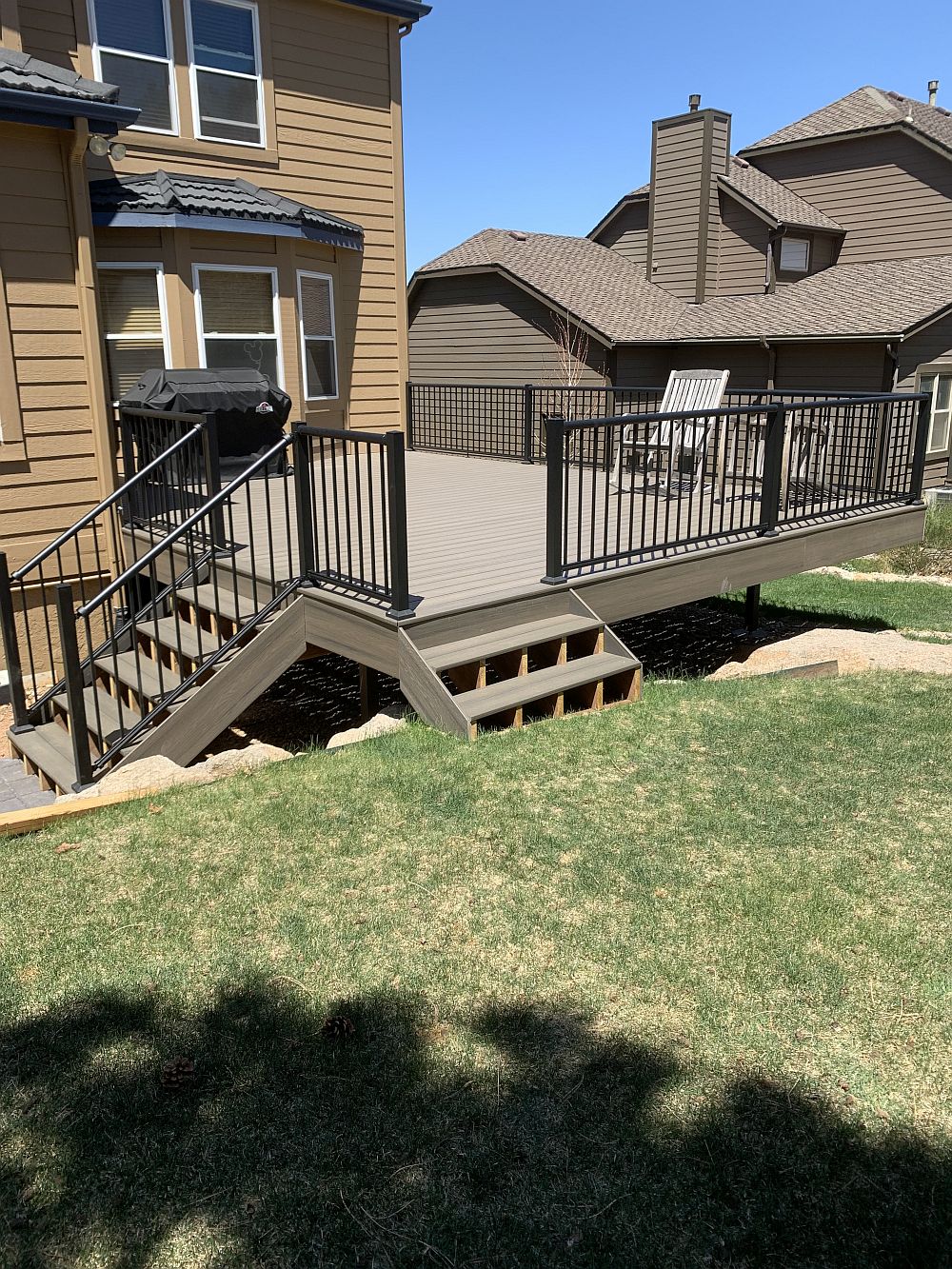 Two 4-'wide staircases on a composite deck