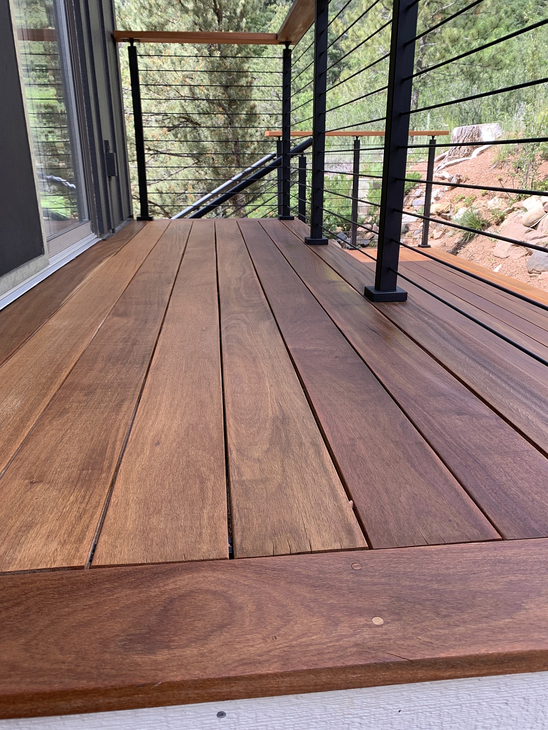Cumaru hardwood deck with a custom railing - 3x3 posts with 1/4