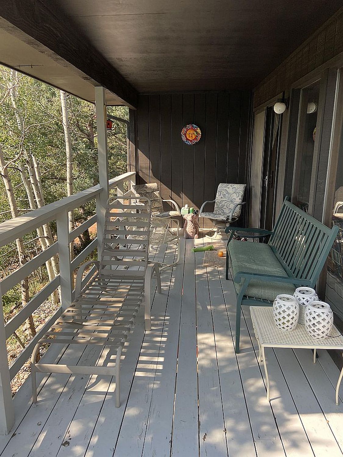 View of a redwood deck before it is removed and replaced by a custom, hardwood deck