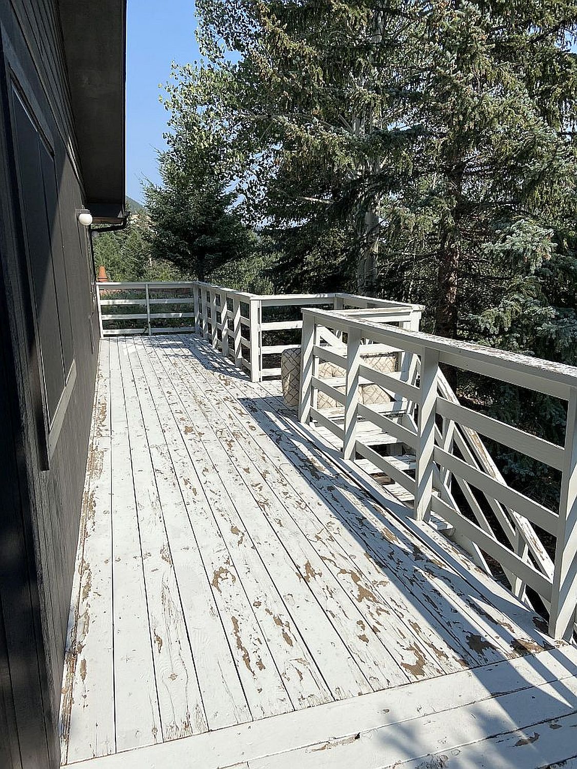 The original, dated redwood deck that was removed